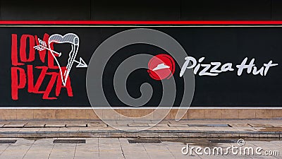 Love logo of famous pizza restaurant in Thailand Editorial Stock Photo